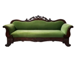 Belle Sofa in hunter green velvet with dark ornate carved wood frame, front view on white background