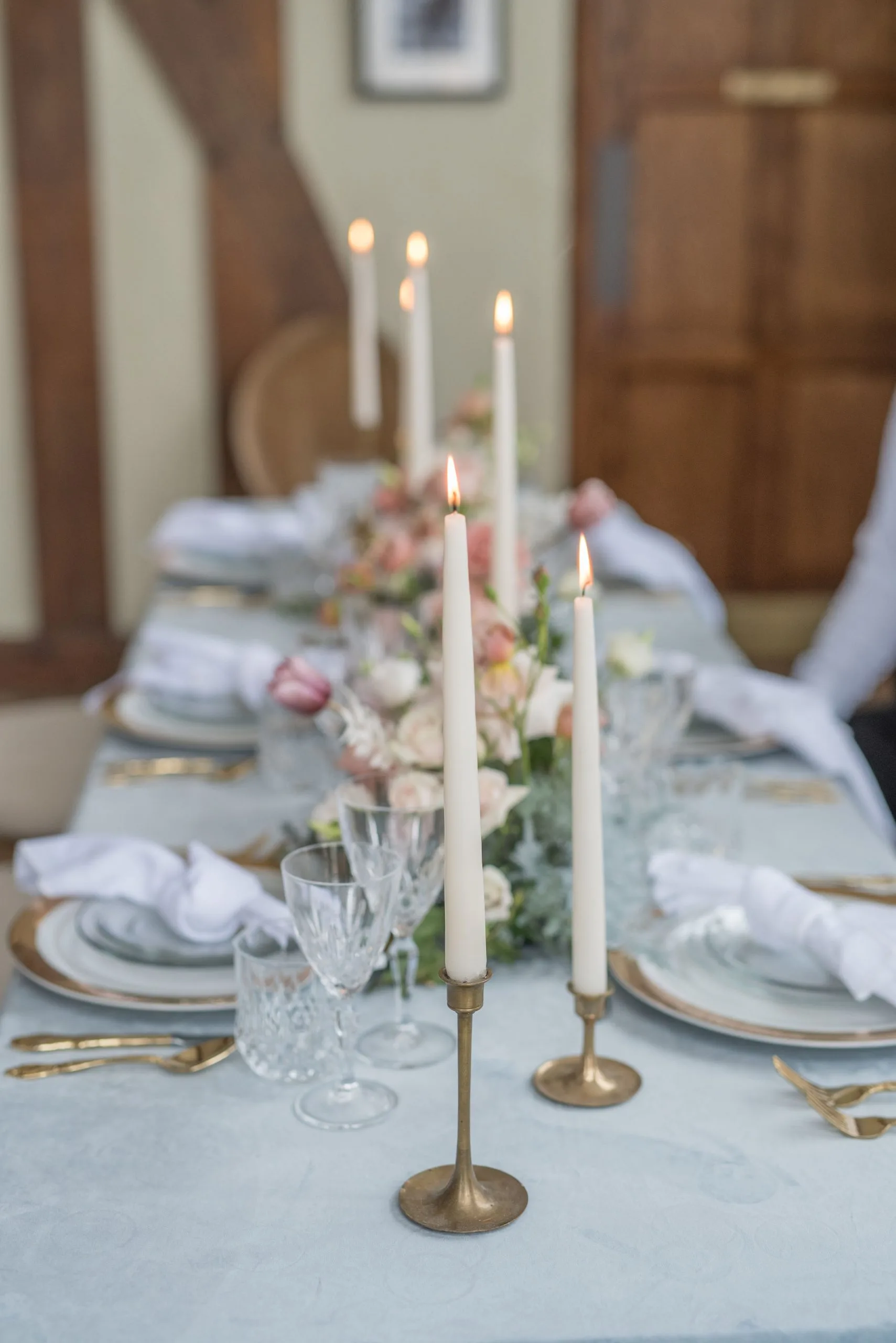 Mismatched-Gold-Candlesticks-as-centerpieces-at-reception-scaled-1.jpg WEBP