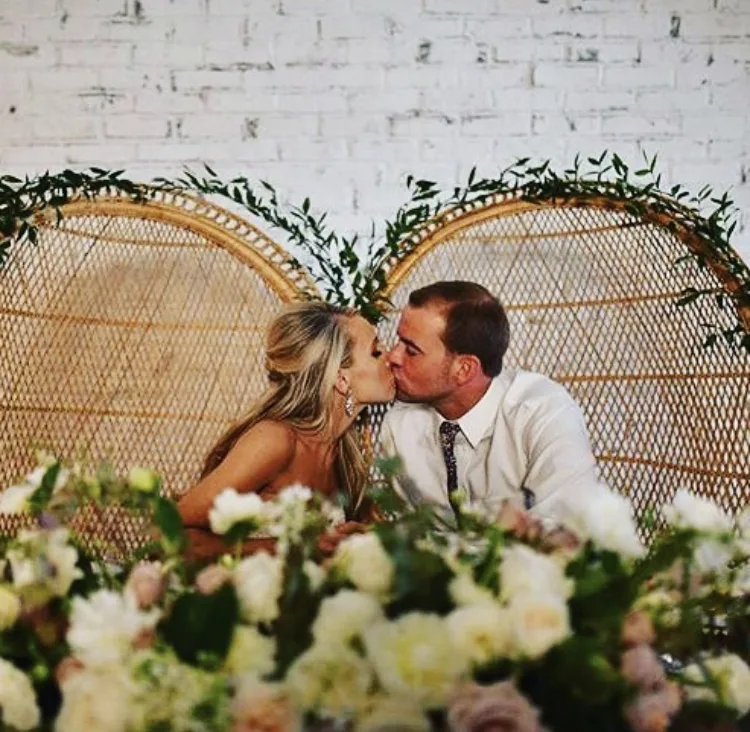 Peacock-chair-rentals-used-at-headtable-in-wedding-reception.jpg WEBP