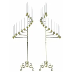 Two gold spiral floor length candelabras.
