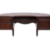 Belvedere Desk front view showing dark wood half-moon top, spindle legs, and ornate carved detail