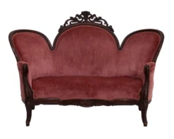 Duchess Settee - antique deep pink velveteen settee with carved dark wood trim for rent in Indianapolis