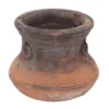 Consuelo Planter in weathered terracotta finish, large round vessel shown with greenery