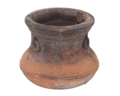 Consuelo Planter in weathered terracotta finish, large round vessel shown with greenery