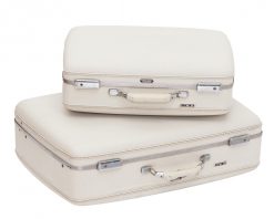 Cady Luggage Set in white vintage-style cases, styled in a staggered arrangement, side view