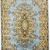 Oversized vintage area rug with a blue and yellow pattern and fringed edges