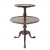 Dark wood two tiered table with feet