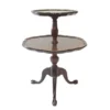 Dark wood two tiered table with feet