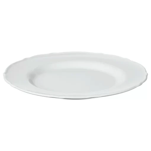 White porcelain plates with scalloped edges