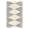 Arial view of the creek rug. Cream colored with black pinstripes making diamond shapes down the middle