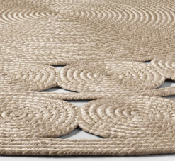 Round natural jute rug with braided circles