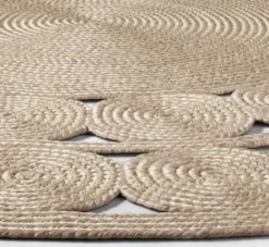 Round natural jute rug with braided circles