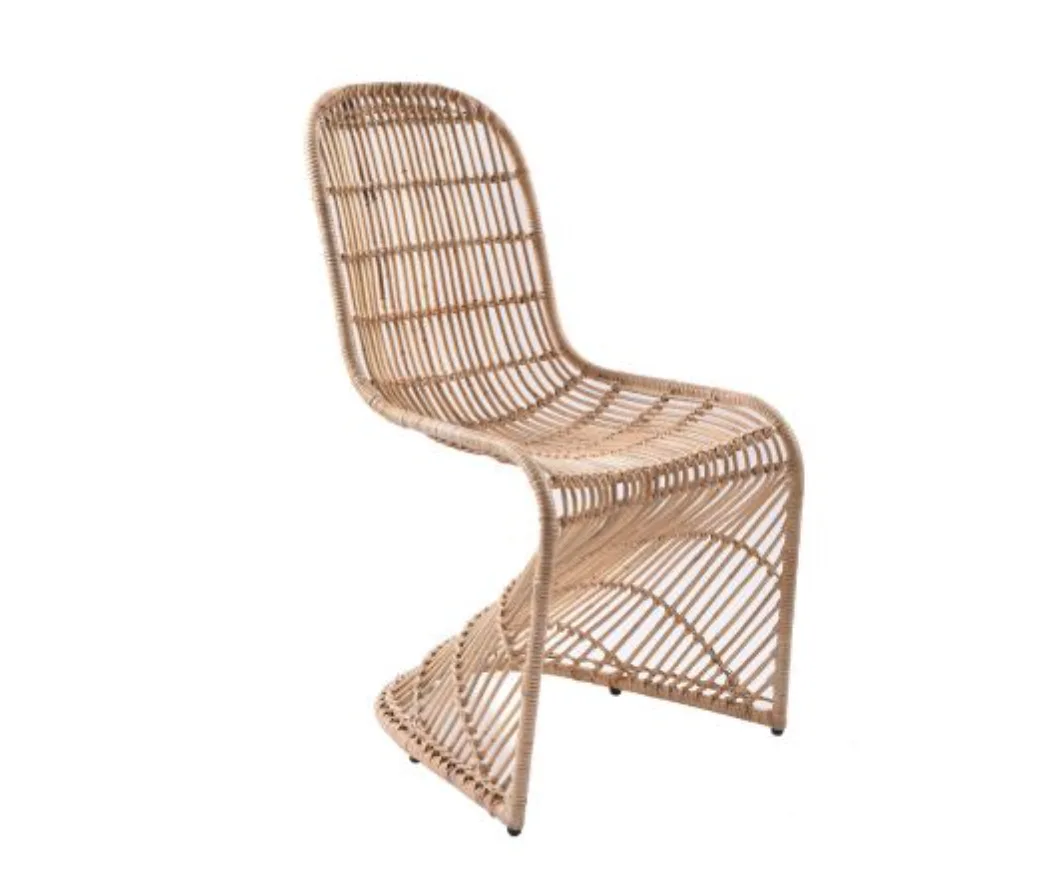 Roxton Rattan Chair WEBP Woven rattan in a neutral wooden shade, the chair is an S shape.