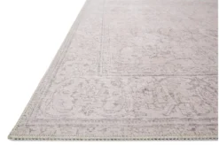 Close up of rug - tan with faded design details