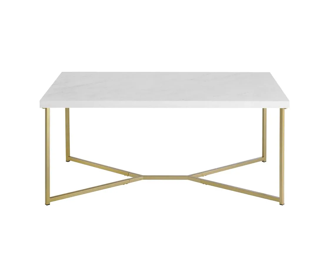 Walker Coffee Table WEBP Rectangular coffee table with white marble top and 4 gold legs tapering to a Y at the base