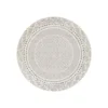Round tan area rug with black design
