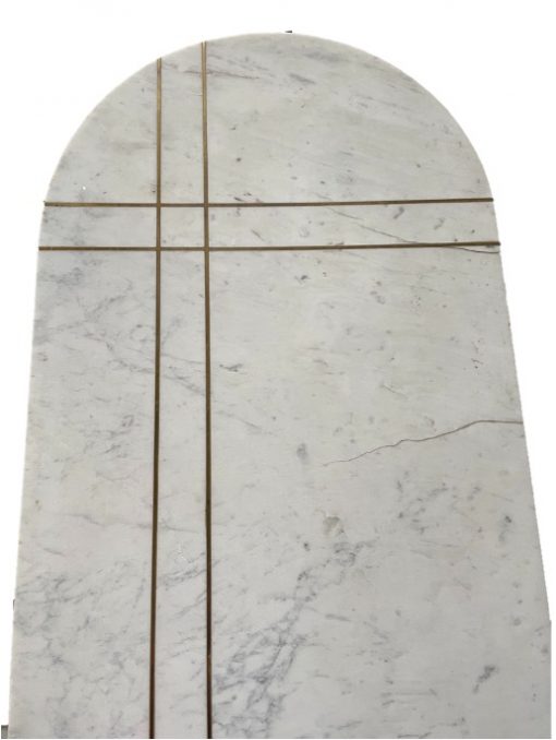 Top of Topher desk - rounded oval shaped with marble top and two parallel inlaid gold lines that intersect