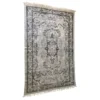 Black and off white rug with a medallion in the middle and border.
