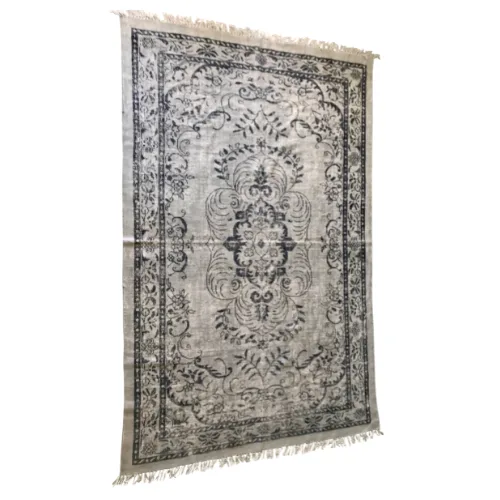 Tori Rug WEBP Black and off white rug with a medallion in the middle and border.