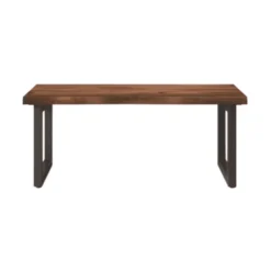 Coffee table with a stained wooden top and industrial metal legs.