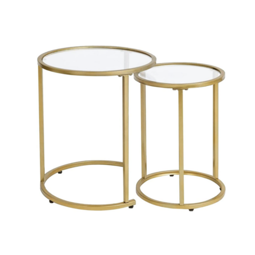 Two minimalist nesting gold side tables. Circular top with gold lining and glass top. 3 gold legs down to the base, which is round.