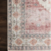 arial view of corner of rug with soft pinks and ivory