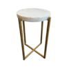 Short accent table with white marble top and 4 gold straight legs that make a 90 degree turn at the bottom and cross into an X.