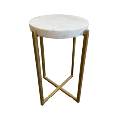 Short accent table with white marble top and 4 gold straight legs that make a 90 degree turn at the bottom and cross into an X.