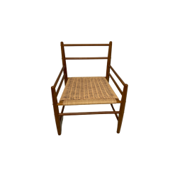 Light wood arm chair. Cushions can be removed individually. Woven light brown seat.