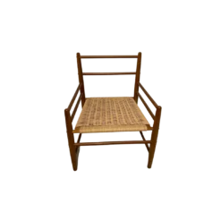 Light wood arm chair. Cushions can be removed individually. Woven light brown seat.