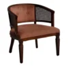 Dahlia Chair in dusty pink velvet with dark wood frame and cane sides, front three-quarter view