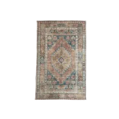 Traditional area rug with medallion. Multicolored with amber/green/teal/turq/pink/brown/ivory/red/yellow