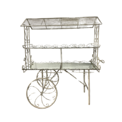 Antique White metal display cart with two mirrored shelves. Wheels on one side.