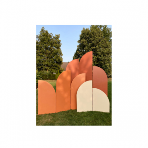 Small bi-fold panel is 48 inches tall, in the front in cream with round arches. Middle 3-fold panel is 66 inches tall with various curve topped shapes. Rust colored. Final tri-fold panel is 98 inches tall and a burnt orange.