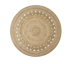 Natural jute rug - round. Solid center with small circles about 3 quarters of the way out surrounded with another layer of solid jute.
