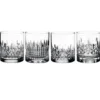 Collection of mismatched vintage cut glass tumblers with varied faceted and ribbed patterns, clear glass