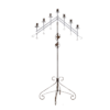 Floor standing candelabra with an inverted V at the top. Holds 7 taper candlesticks.