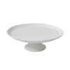 Round ceramic glossed pedestal cake stand with slightly scalloped edges.