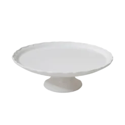 Round ceramic glossed pedestal cake stand with slightly scalloped edges.