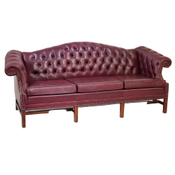 Side view of a maroon chesterfield sofa