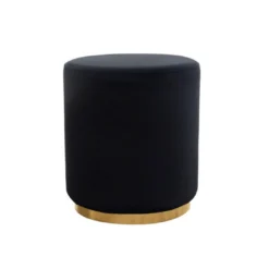 Solid black velvet round ottoman with a gold base
