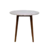 Round marble bistro table with straight wooden legs.