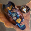 Wooden side table arial view with items from the groom - socks, watch, shoes, etc.