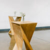 Solid wood modern cocktail tables with a twist in the wood.