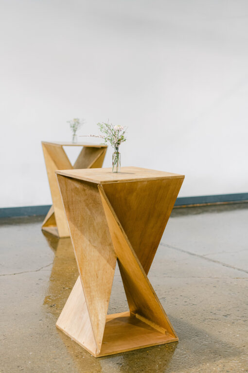 Solid wood modern cocktail tables with a twist in the wood.