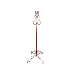 Copper colored ornate floor standing candlestick. Four feet on the floor curve into 1 solid stick with curved detail at the top. Holds 1 candle.