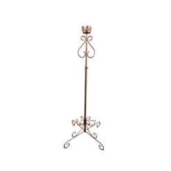 Copper colored ornate floor standing candlestick. Four feet on the floor curve into 1 solid stick with curved detail at the top. Holds 1 candle.