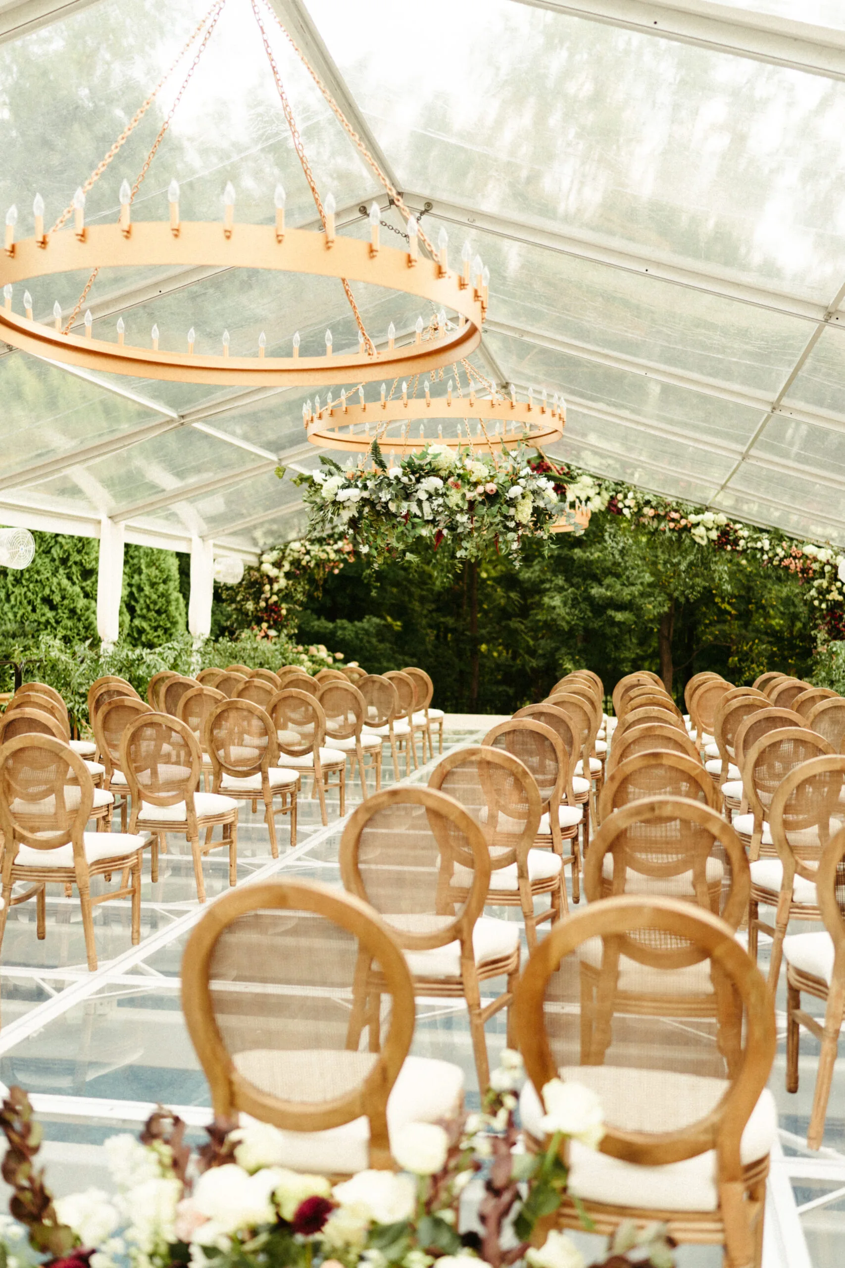 eric-veronica-wedding-brynnaisabell(200of859) WEBP Louis cane back chairs set up for a wedding ceremony.