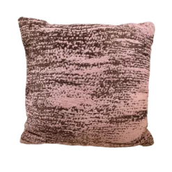 Pink square pillow with brown and gold flecks in faint stripes