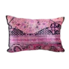 Shades of pink in whimsical curvy designs in a rectangular pillow